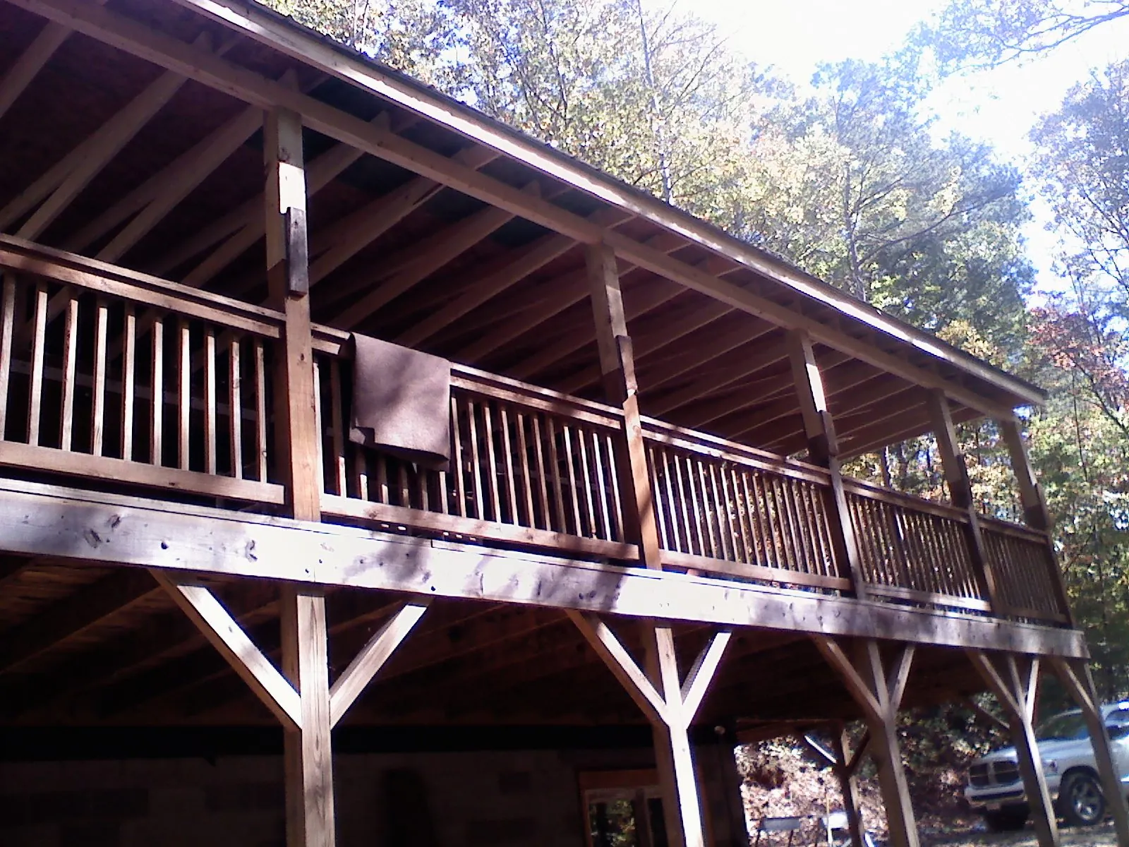 Timber framing under a new elevated porch and deck — Roof Leak Repair in Redlands by Roofing Brothers